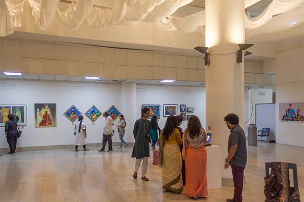 Artist explaining their work