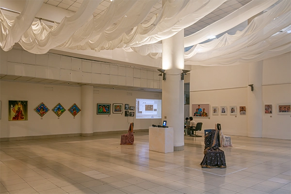 Visitors interacting with art